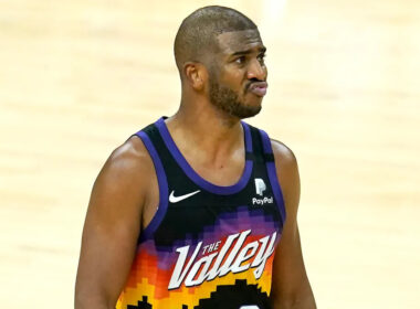 Chris Paul holding basketball, dreaming of an NBA title