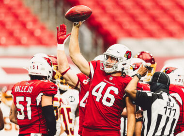 Aaron Brewer in Arizona Cardinals uniform, ready for the snap