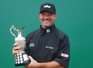 Alex Cejka holding the Senior Open Championship trophy