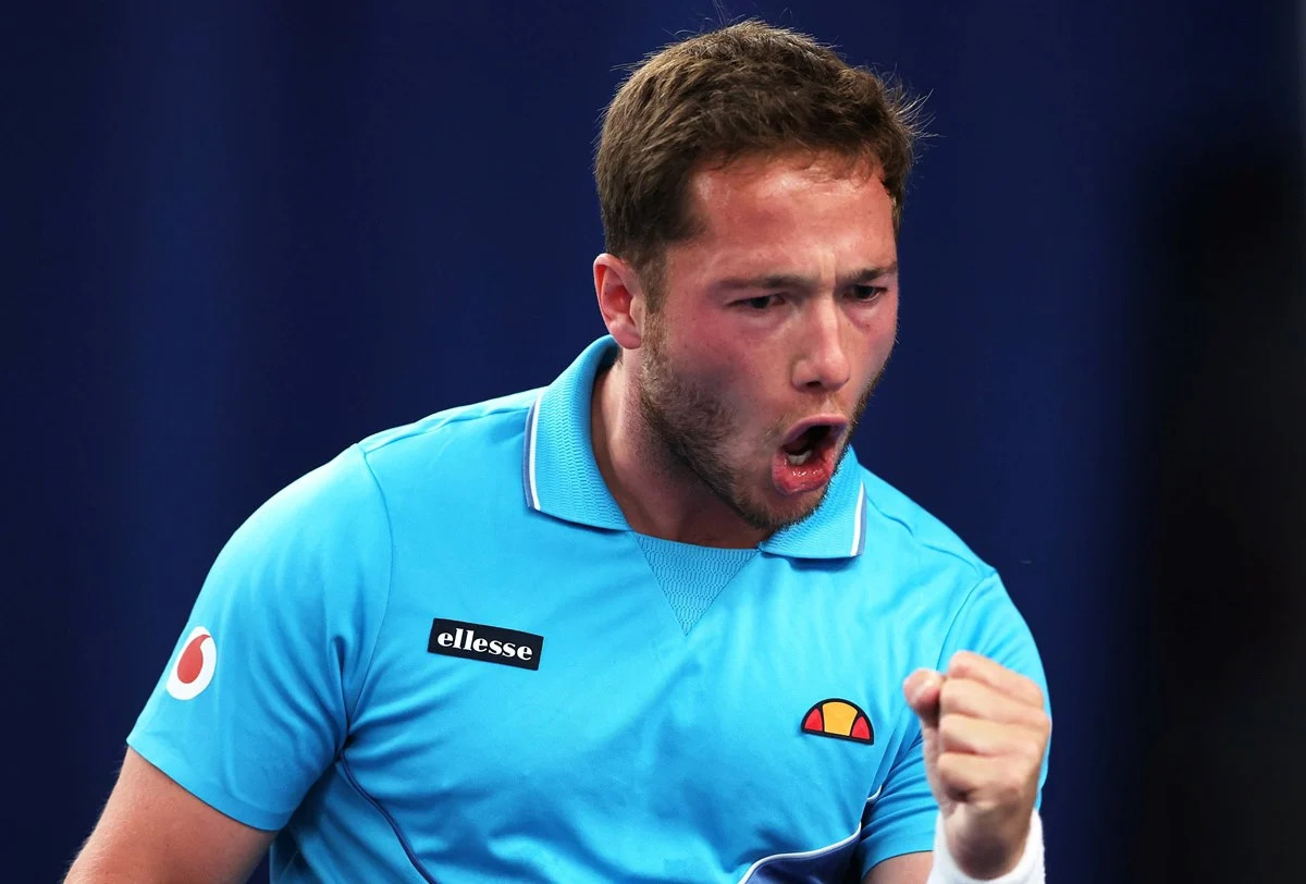 Alfie Hewett lifting the trophy after winning the British Open Wheelchair Tennis Championship