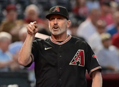 Torey Lovullo celebrating with the team after signing a contract extension